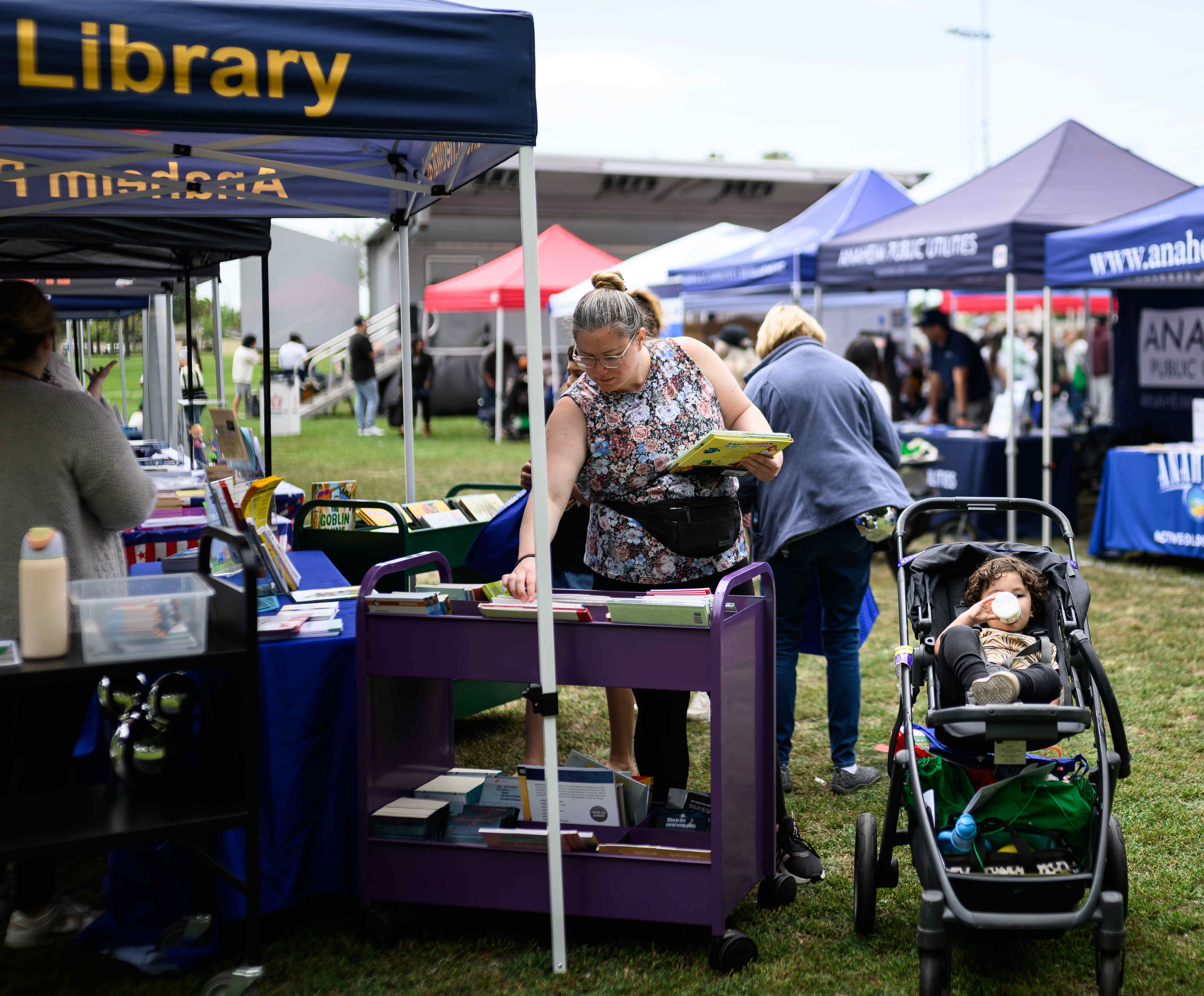 Brittany Alvarado looks through a book display at the Anaheim...