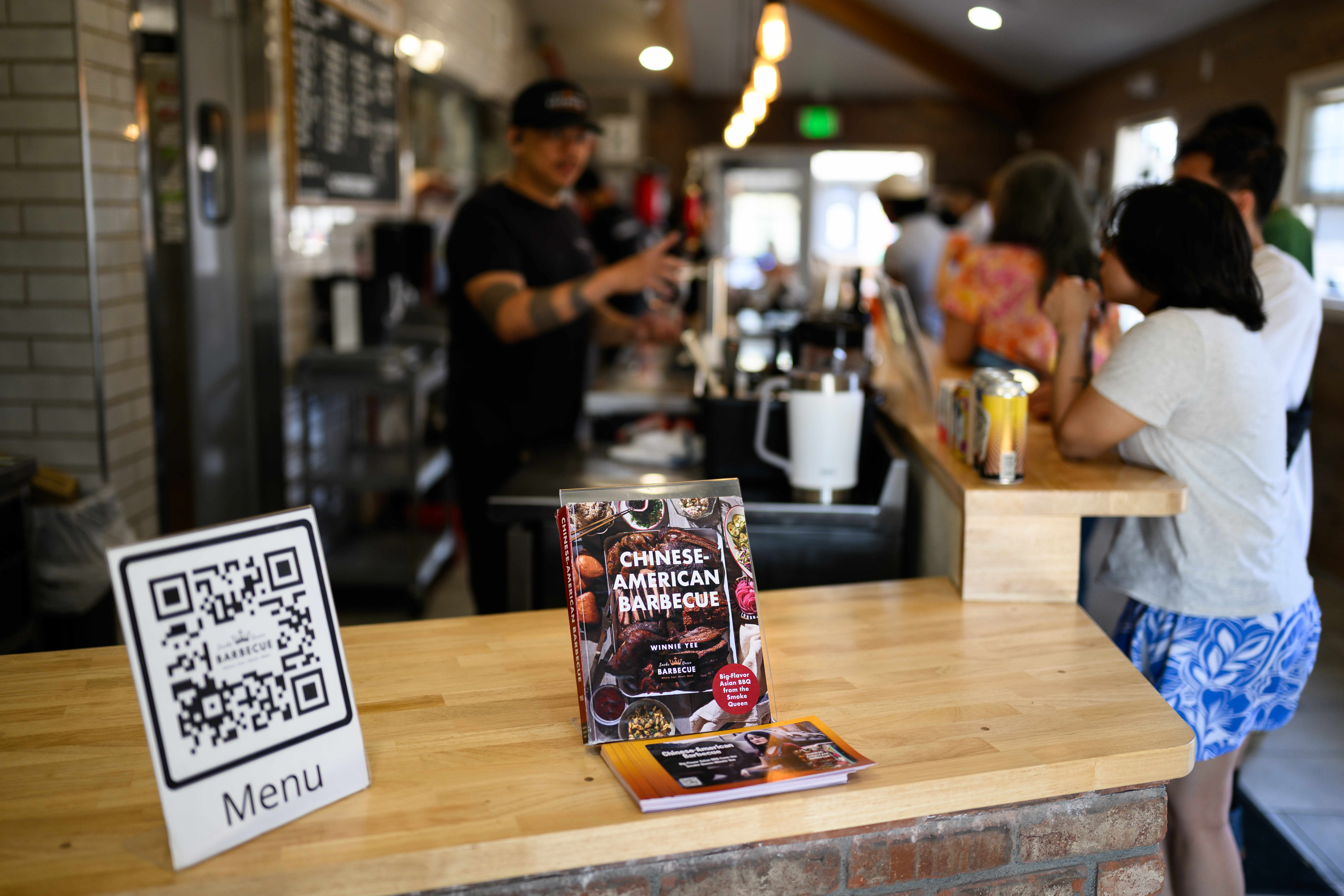 The “Chinese-American Barbecue” book by Winnie Yee-Lakhani is seen at...