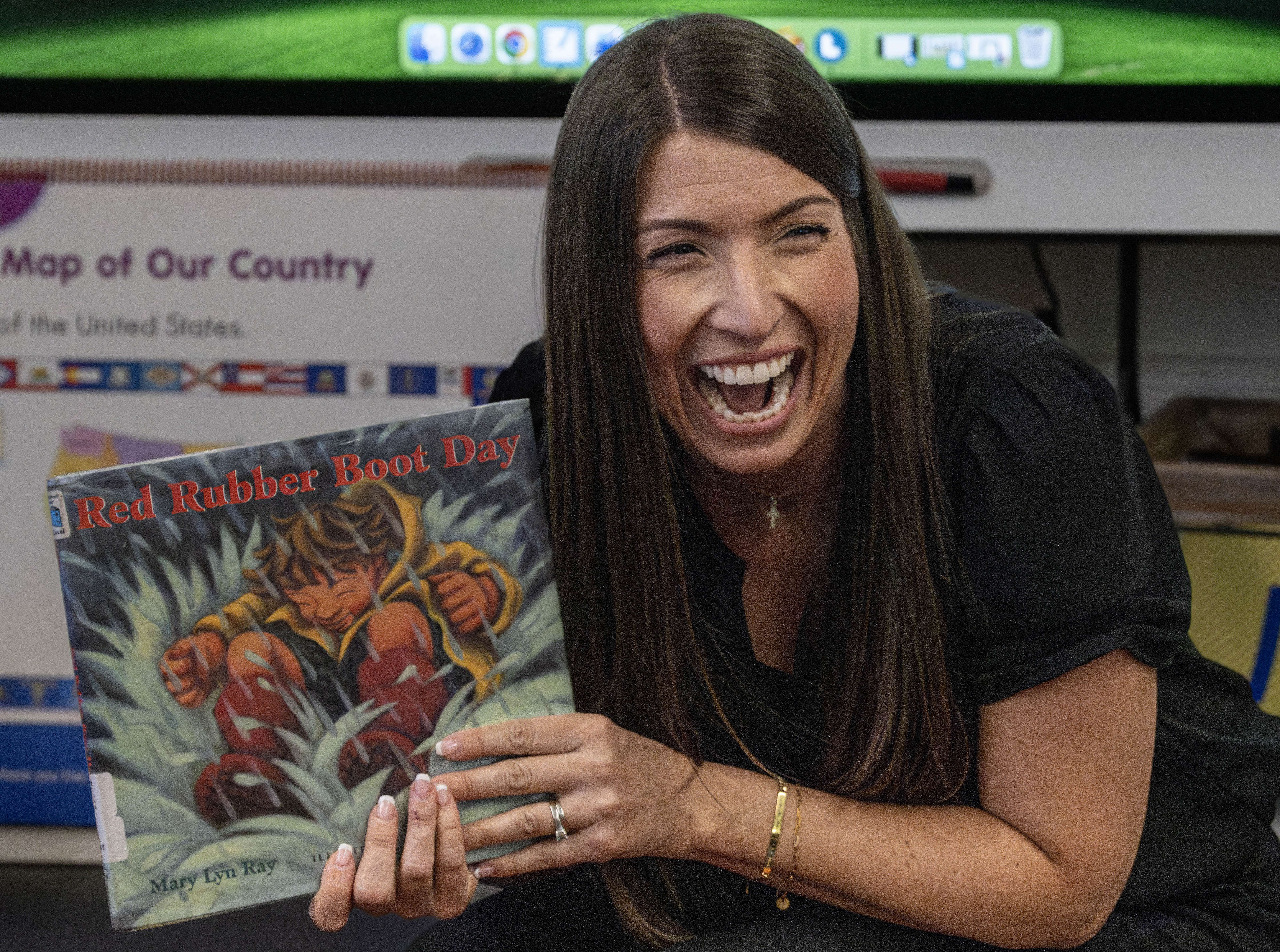 While reading her students a book, Dr. Peter Marshall Elementary...