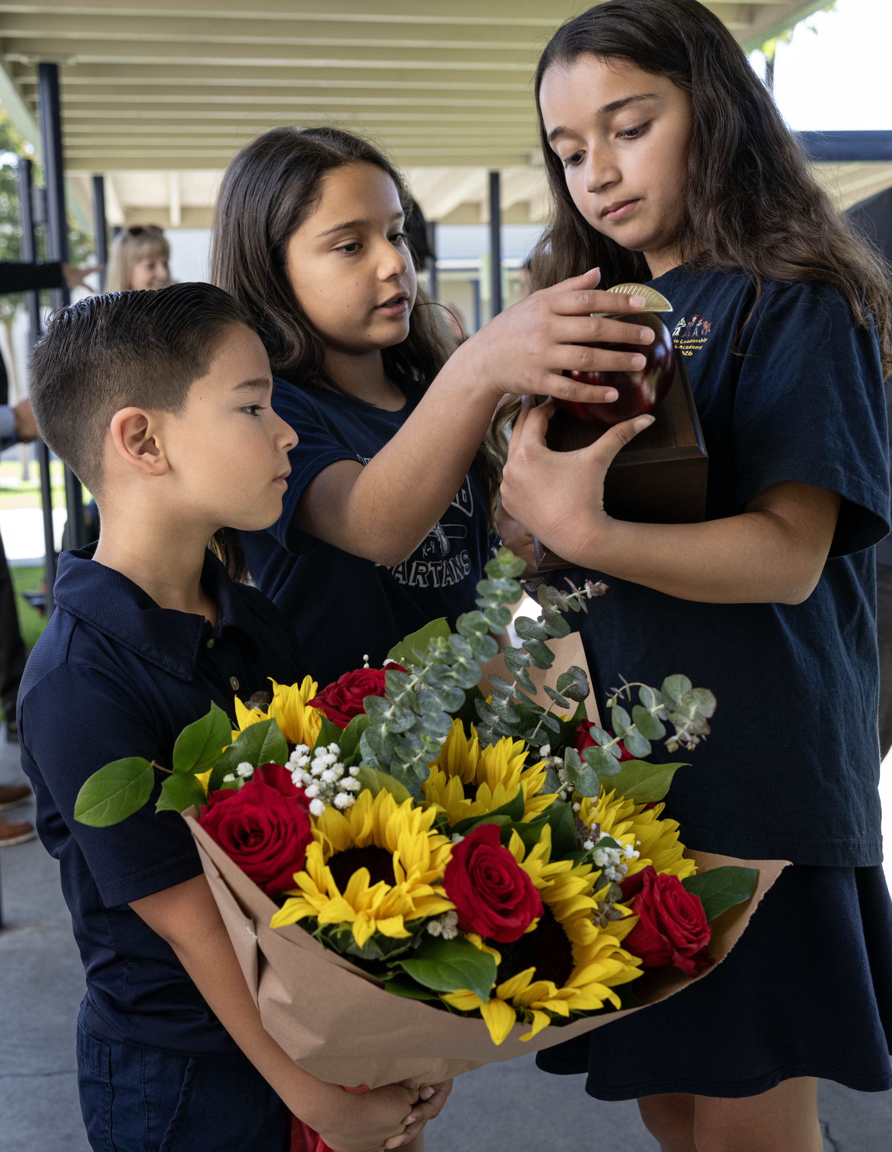 Wendy Saldivar’s children: Aaron, 6, from left, Julia, 9, and...