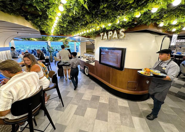 Indulge Food Hall on the newly launched Norwegian Luna and three sister Prima-class ships features a modern take on the food-court format. (Photo by David Dickstein)