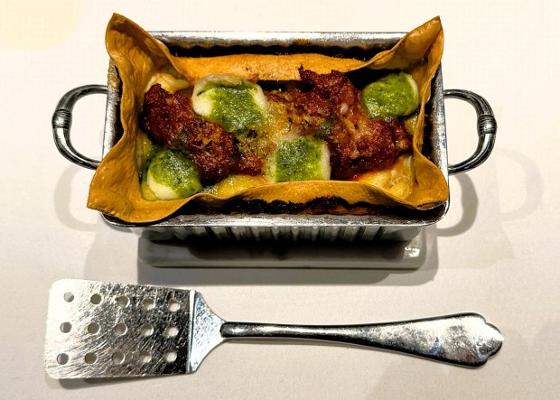 Lasagnetta alla bolognese, served at Crystal's Italian specialty restaurants, is baked with passata, reflecting the return of old-school techniques to modern cruise-ship dining. (Photo by David Dickstein)