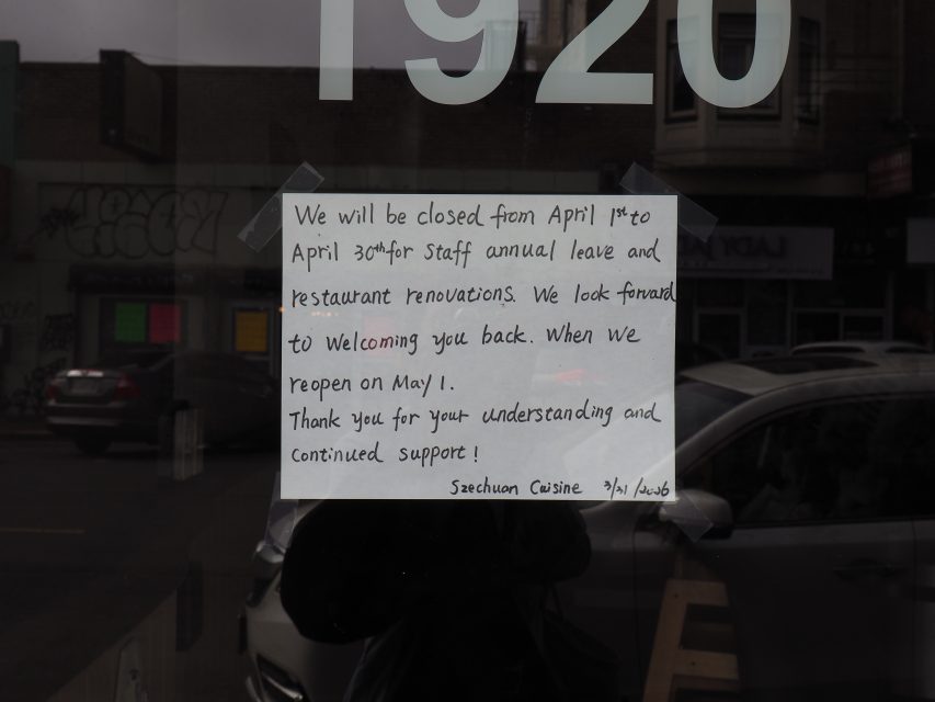 A handwritten sign on the glass door of sf-golden-gate-psychic-szechuan-cuisine announces the restaurant will be closed from April 1 to April 30 for staff leave and renovations, reopening May 1.