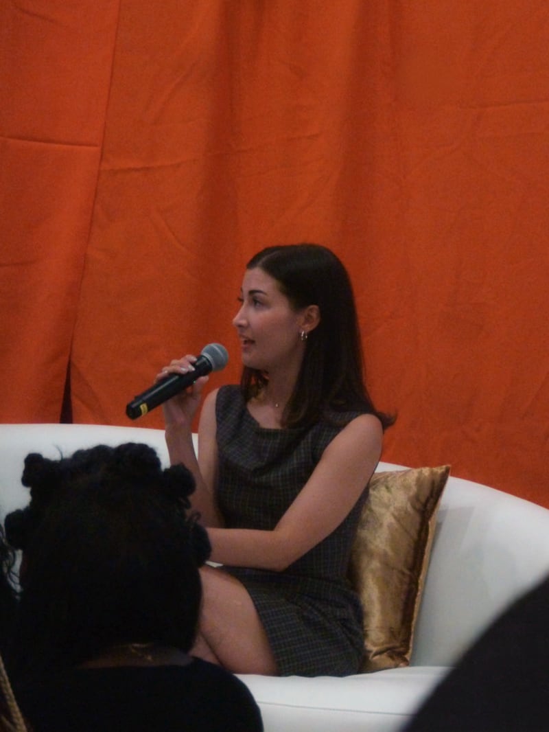 Woman with a mic.