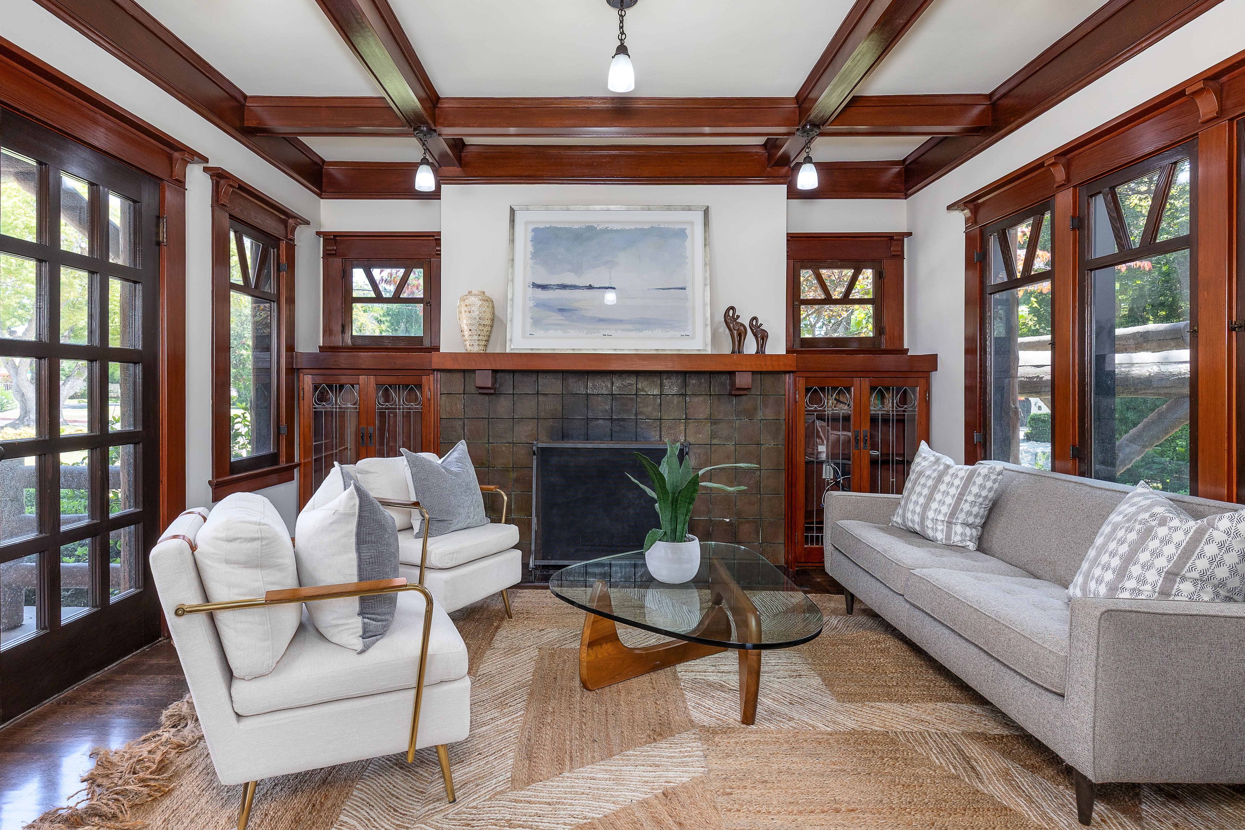 A tiled fireplace anchors the den. (Photo by Susan Pickering)