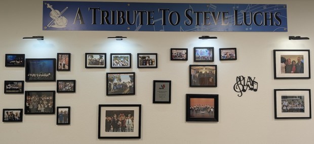 A display paying tribute to Steve Luch's career at Crown Point Junior Music Academy from 2008 until his death in April 2022. He brought the Susuki method of violin instruction to the campus. (Lindsay Phillips)