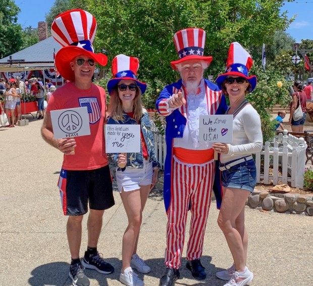 Charles Keith, second from right, portrayed Uncle Sam while greeting visitors to the city's Old Fashioned Fourth of July event. (Courtesy city of Poway)