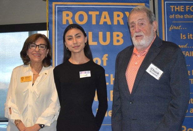 Rotarian Maguy Feghali, Arilla St. Laurent Scholarship Award recipient Maithed Lopez and Chuck St. Laurent. The award was established to honor his late wife, who was an RB Rotarian. (Elizabeth Marie Himchak)