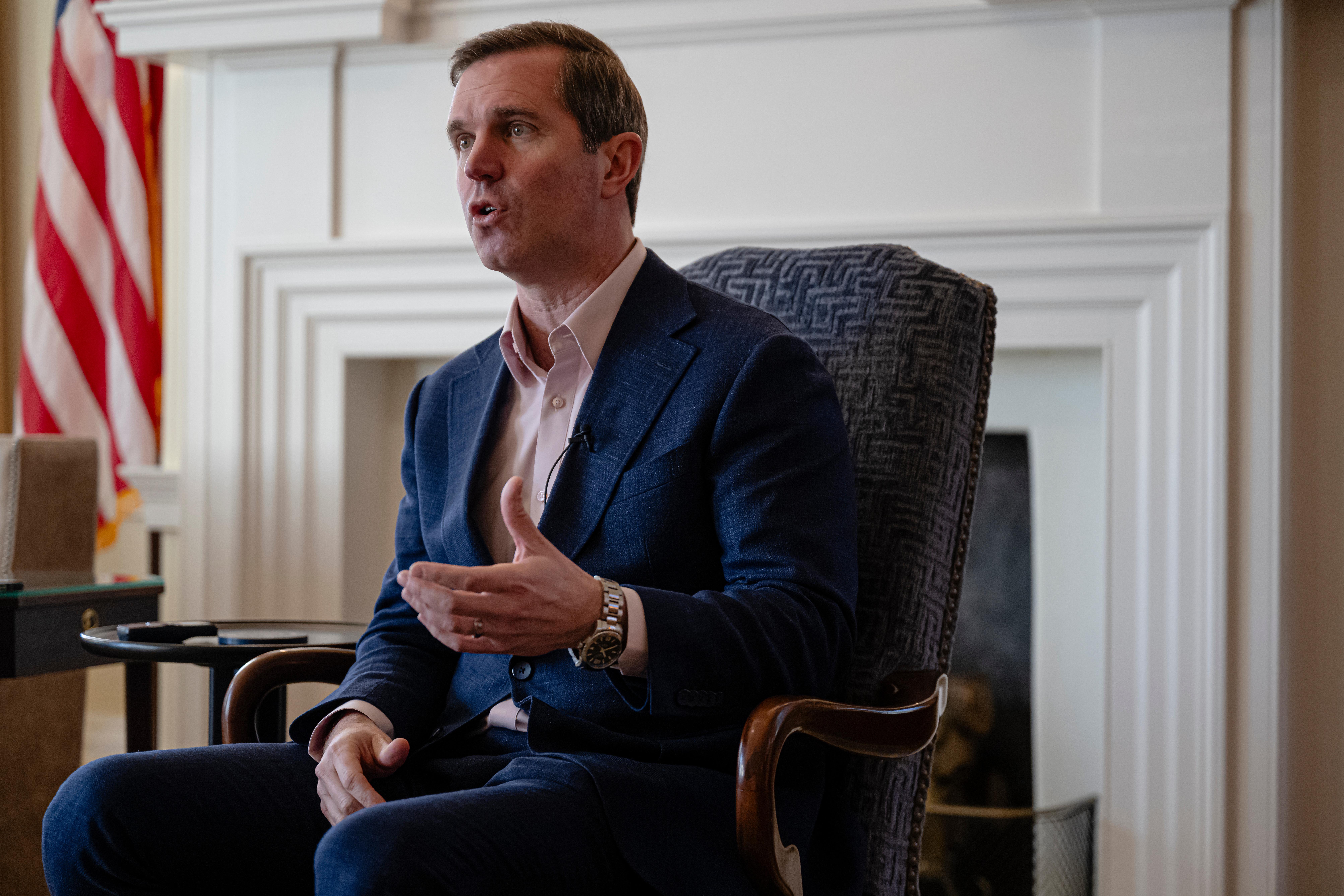 FILE – Kentucky Gov. Andy Beshear gives an interview, Jan....