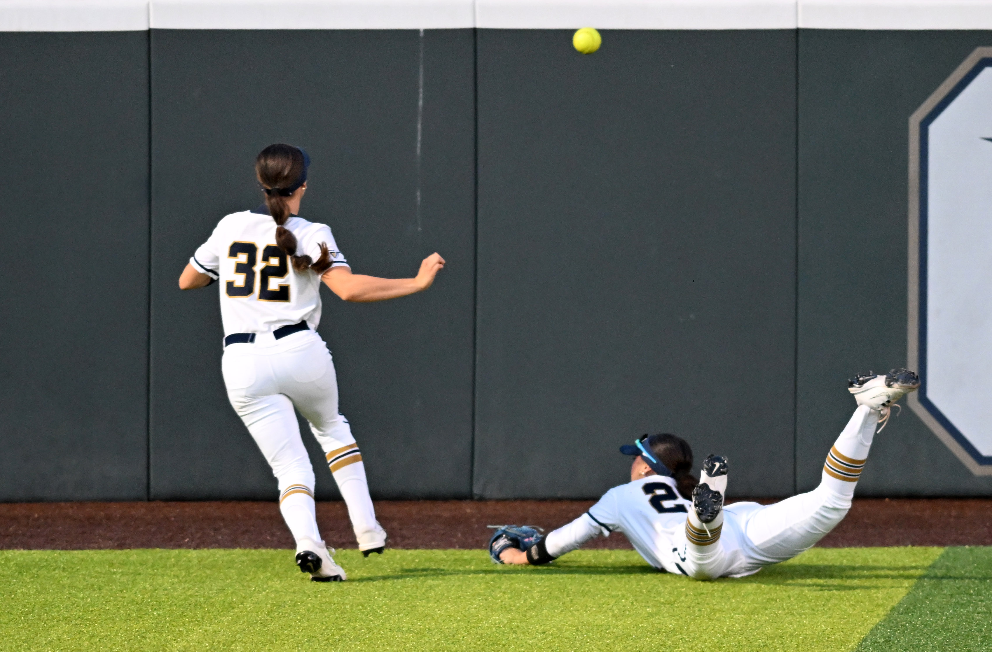 California Baptist University’s Savannah Gatewood and Makayla Medellin try to...