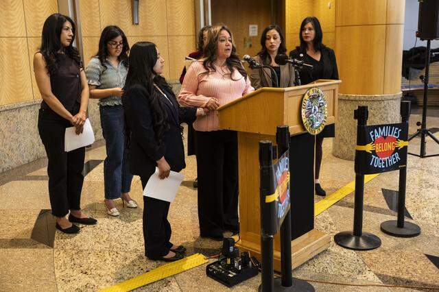 Maria de Jesus Estrada Juarez attends a news conference with her daughter Damaris at Sacramento City Hall on Tuesday. Estrada Juarez was able to return to the United States on Monday night after being in Mexico for 40 days.