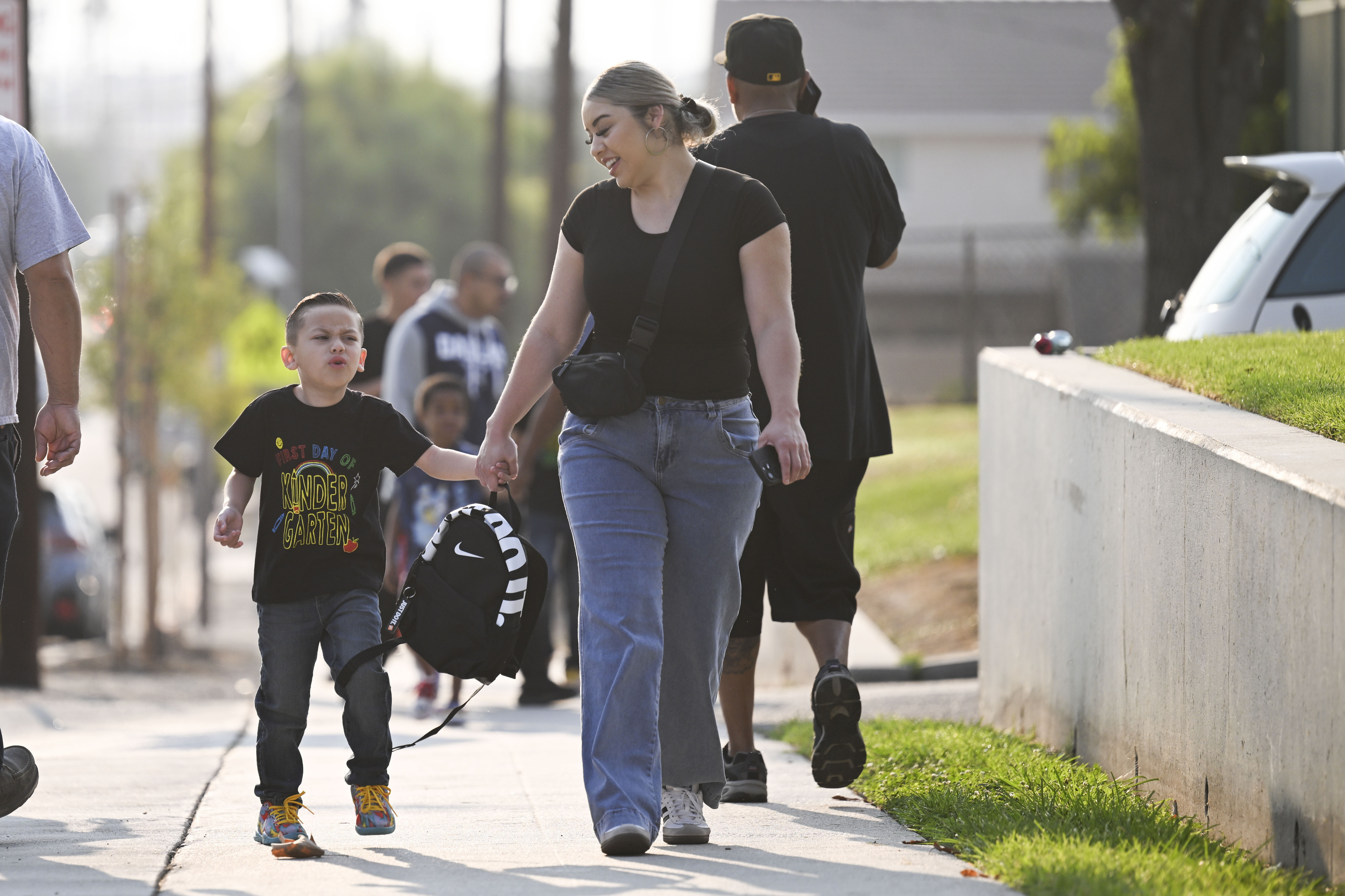 Students and their parents walk into McKinley Elementary on the...