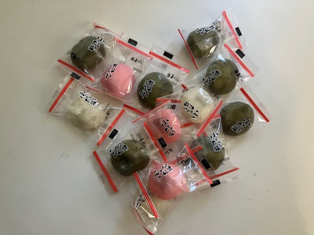 Individually-wrapped mini daifuku, mochi bites wrapped around red bean paste, are a soft, chewy, sweet treat and can be found at Osaka Marketplace in Foster City. (Kate Bradshaw/Bay Area News Group)