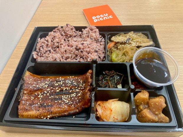 Pogu Picnic, situated inside Mega Mart in East Palo Alto, is a fast-casual take on Pogu, the Korean restaurant inside the grocers' sister store in Daly City, Jagalchi. Here, you can order a custom tray with rice, banchan and the customer's choice of protein -- eel is shown here. (Kate Bradshaw/Bay Area News Group)