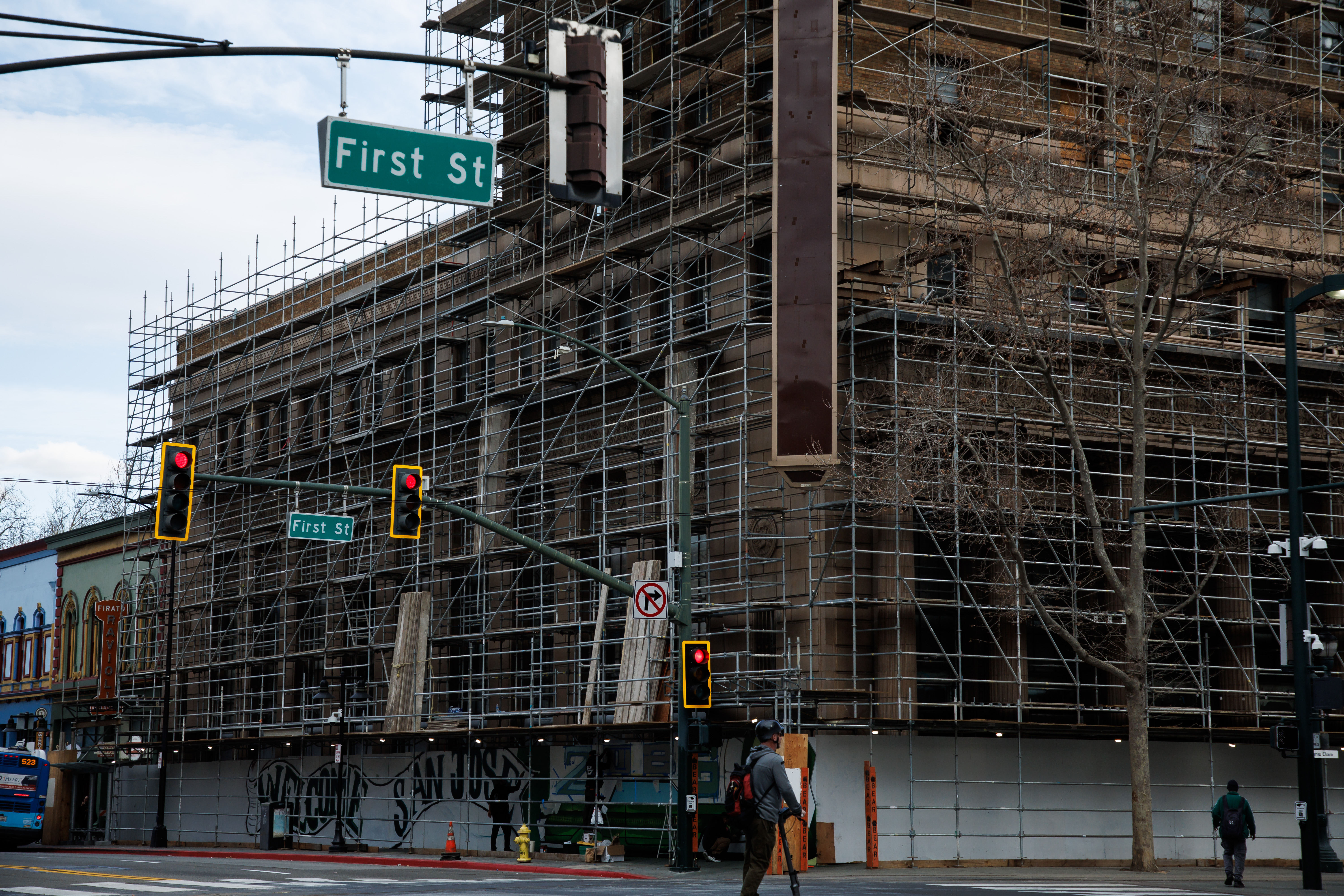 Scaffolding covers the historic Bank of Italy tower in downtown...