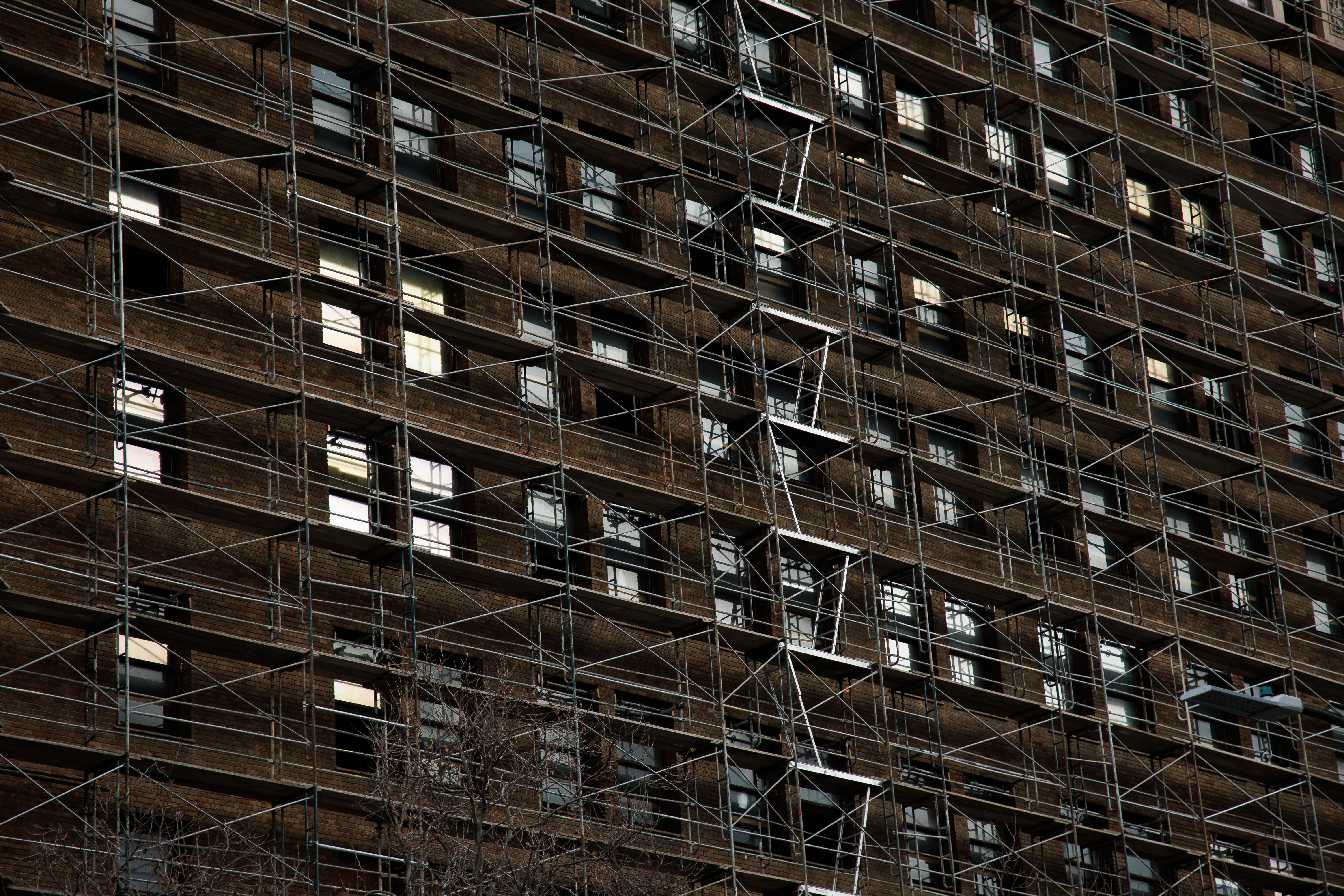 Scaffolding covers the historic Bank of Italy tower in downtown...