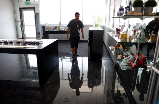 Sonny Roldan, inventory manager, checks inventory at Plu2O Dispensary in San Jose, Calif., on Thursday, April 9, 2026. (Nhat V. Meyer/Bay Area News Group)
