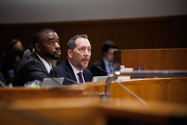 Santa Clara County Social Services Agency Director Daniel Little gives a presentation with Damion Wright, left, director of Department of Family and Children's Services, defending their family preservation policies during a Santa Clara County Board of Supervisors meeting in San Jose, Calif., on Dec. 19, 2023. (Dai Sugano/Bay Area News Group)
