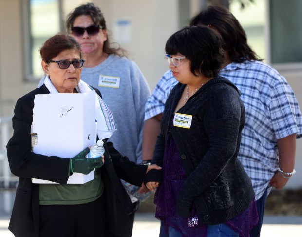 Elva Juarez, left, grandmother of Jaxon Juarez visits with supporters outside the Santa Clara County Juvenile Justice Courthouse on Monday, April 20, 2026, in San Jose, Calif.  The San Jose teenager accused of sexually assaulting his 2-year-old cousin Jaxon Juarez before the toddler died has been charged with murder and county prosecutors will also seek to move the charges to adult court as the teen suspect just turned 18.  (Aric Crabb/Bay Area News Group)