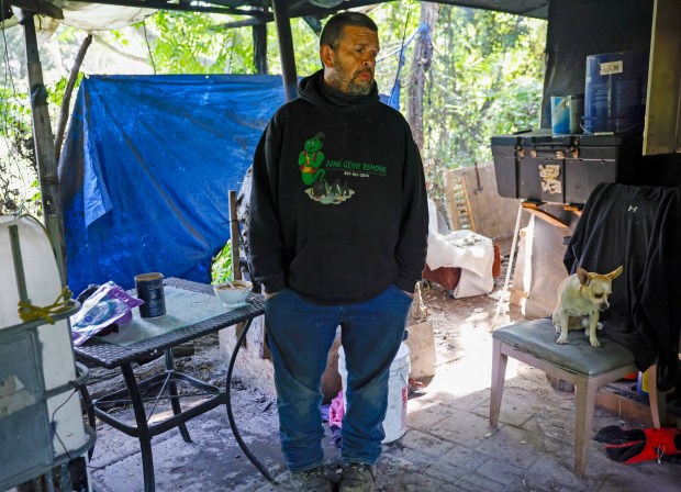 Martin Nava talks about his living situation in a friends structure in the homeless encampment known as the Jungle in San Jose, Calif., on Wednesday, April 15, 2026. (Nhat V. Meyer/Bay Area News Group)