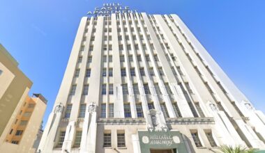 Oakland historic apartment tower is bought for less than prior value