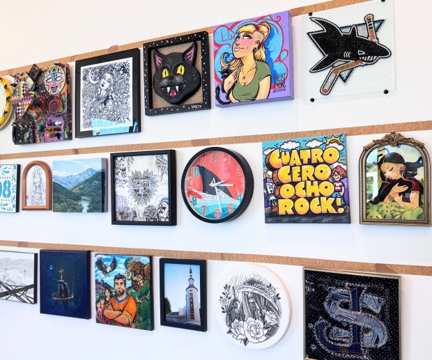 Artwork representing San Jose created by about 100 artists will be on display at a show to kick off the eight annual San Jose Day celebration at Noble Gallery in downtown San Jose on April 8, 2024. (Sal Pizarro/Bay Area News Group)