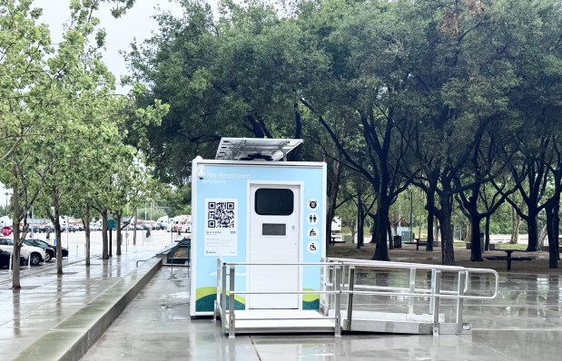 The Throne portable restroom in the Guadalupe River Park's Arena Green West, photographed Friday, April 10, 2026, has a ramp and a wide automatic sliding door for disabled access. (Sal Pizarro/Bay Area News Group)