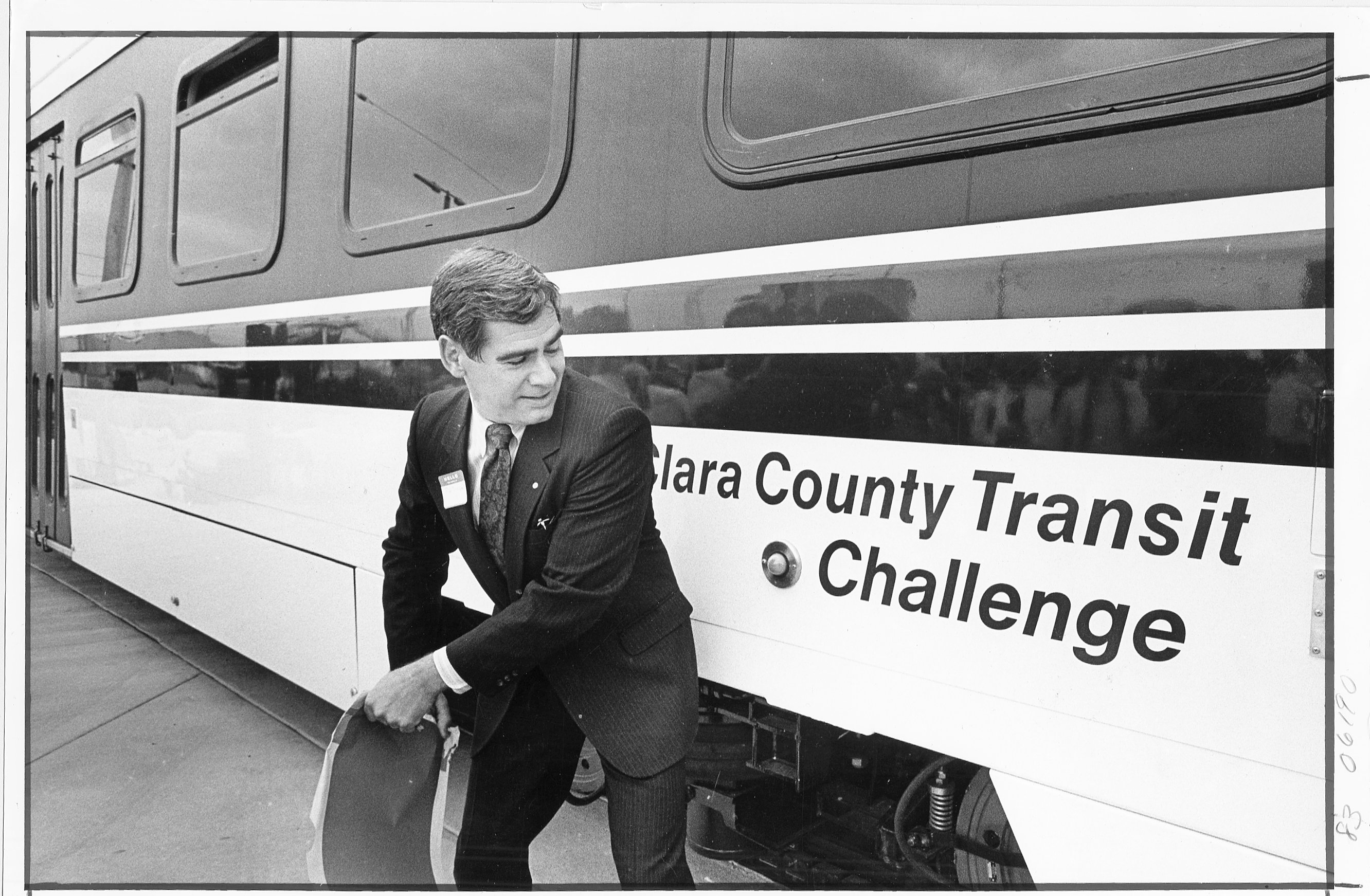 Santa Clara County Supervisor Rod Diridon, rips the tape covering...