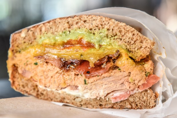 The Angry Tuna is terrific on its own, but Spread deli founder Jordan Trigg suggests gilding the lily by adding candied bacon, as shown above. (Photo courtesy of Spread)