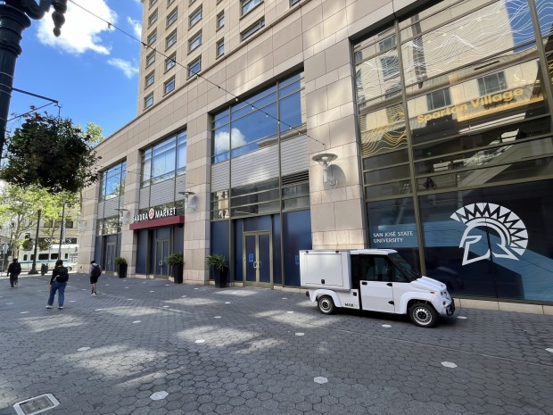 San Jose State University students walk past Sakura Market location in The Paseo de San Antonio between South Market Street and South First Street in downtown San Jose, seen on April 13, 2026.(George Avalos/Bay Area News Group)