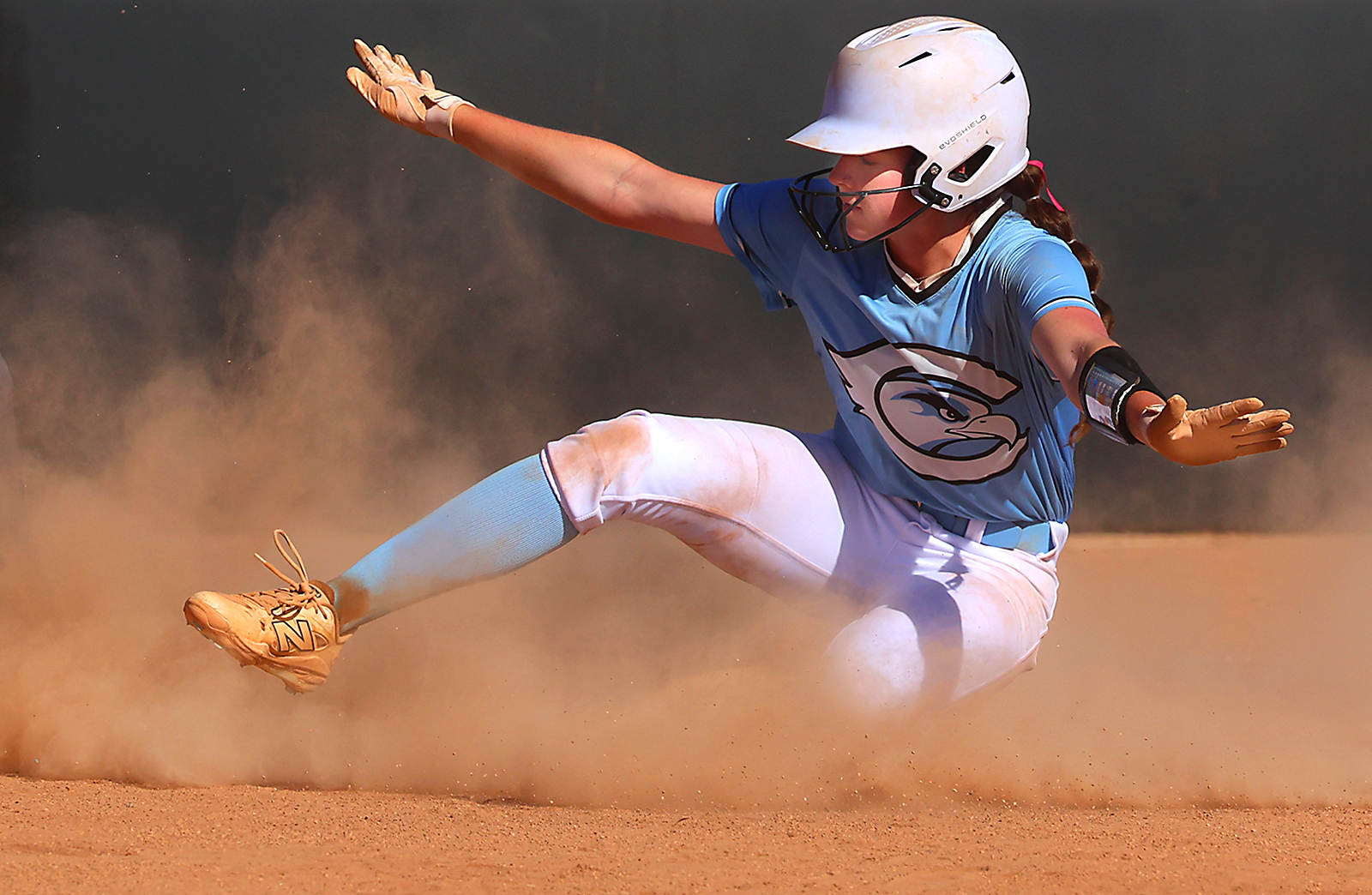 Cabrillo Collegeâs Bailey Fulton signals safe as she slides home...