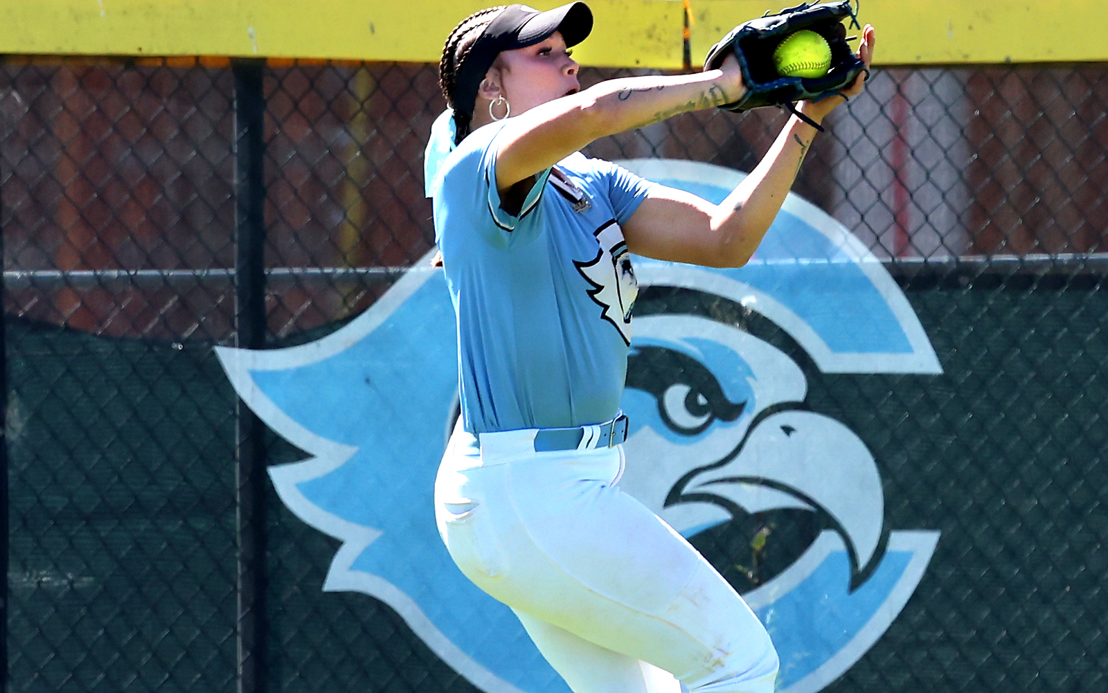 Cabrillo College center fielder Renee Parker snags fly ball near...
