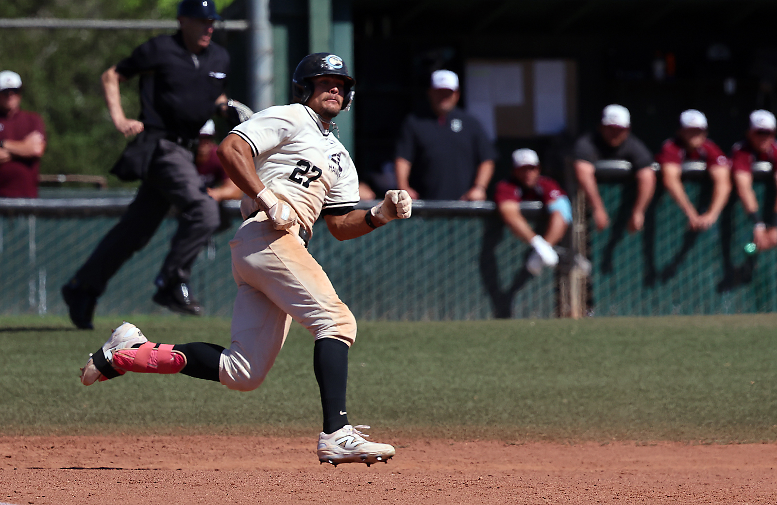 Cabrillo Collegeâs Jayson Schmeisser legs out a standup triple against...