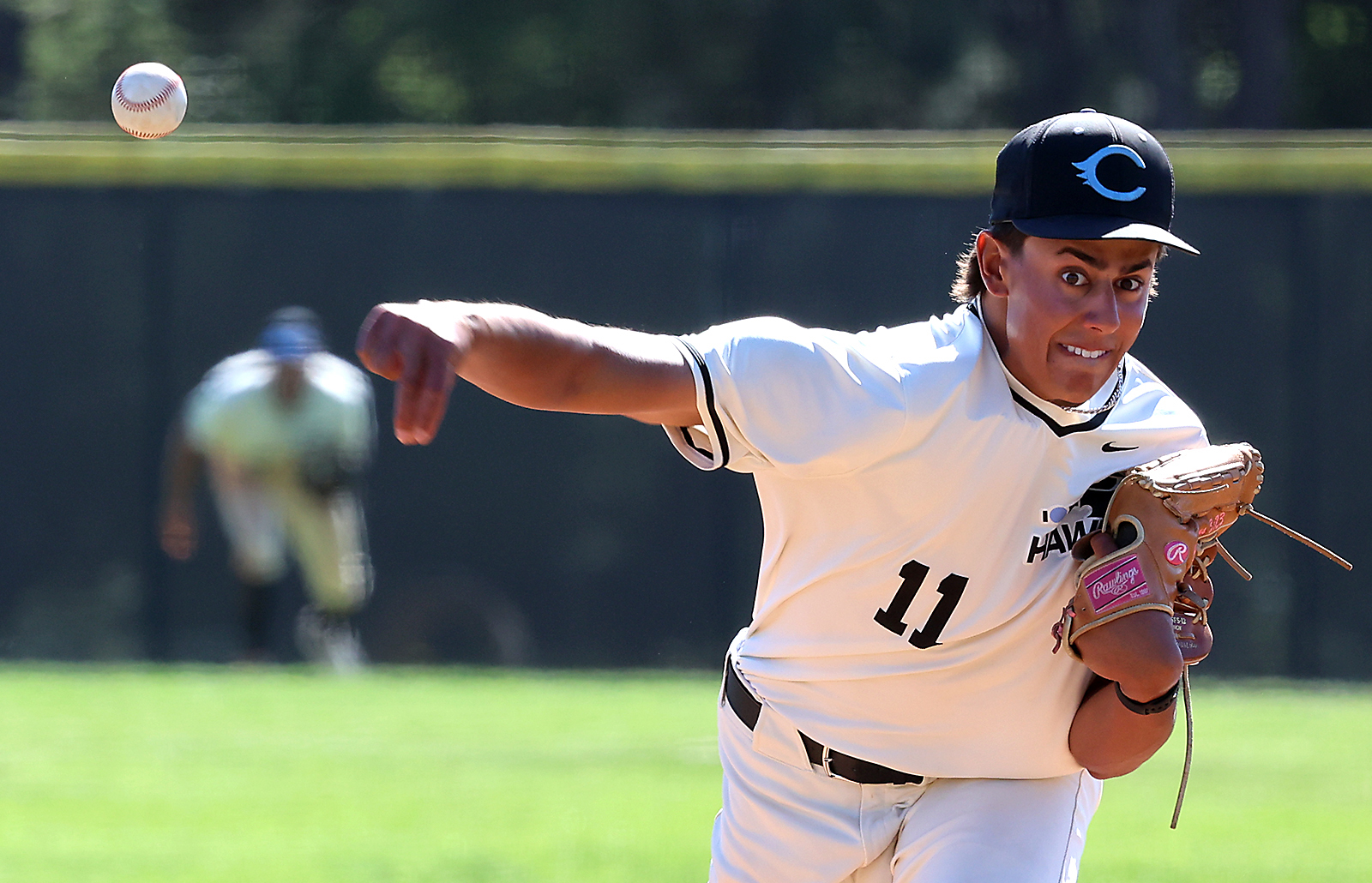 Cabrillo College pitcher Kieran Subramanian delivers against visiting Monterey Peninsula...