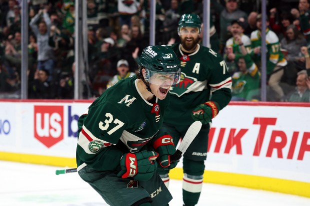 Minnesota Wild rookie Hunter Haight celebrates after scoring his first NHL goal