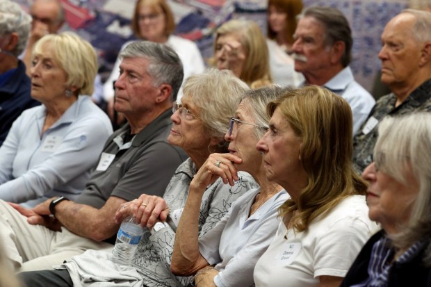 People listen as Rep. Mike Levin speaks at a meeting put on by the Rancho Santa Fe Democratic Club at the Del Mar Fairgrounds in Del Mar on Thursday, March 12, 2026. (Hayne Palmour IV / For The San Diego Union-Tribune)