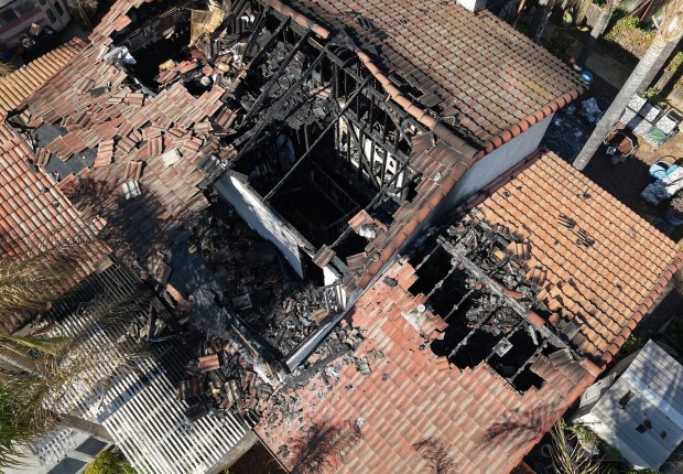 San Marcos, CA_4_1_26_An aerial view of the home at 939 Lacebark Street owned by Michael and Kathryn Austin who died there in an arson fire Saturday night March 28th. Luis Alvarado, a renter living at the home has been arrested, accused of started the fire and will appear in Vista Court Thursday April 2nd. Photo by John Gastaldo for the Union-Tribune