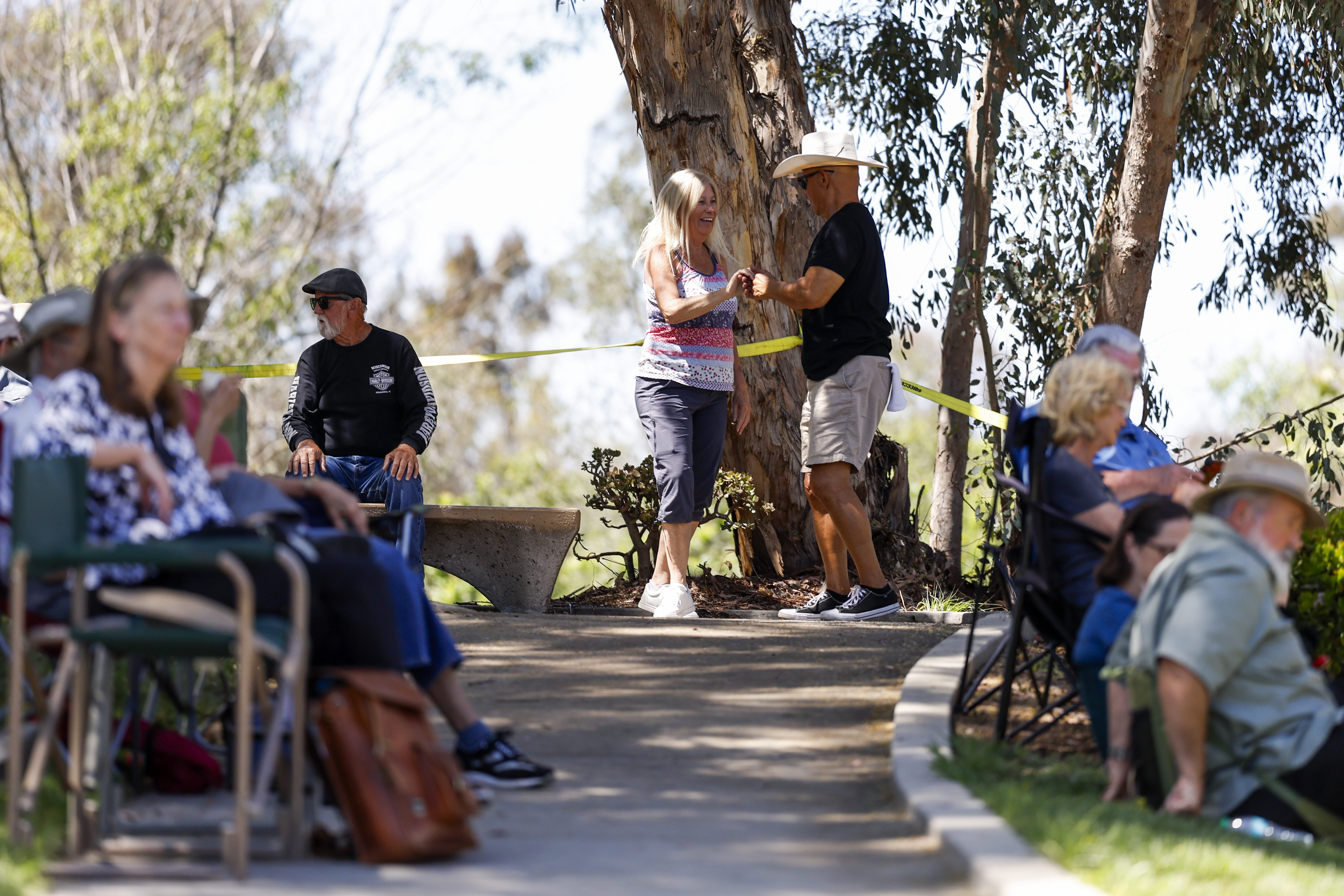 Judy Jacquez and Willie Dorsey, of San Diego, dance during...
