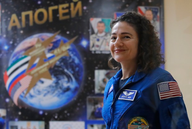 U.S. astronaut Jessica Meir, member of the main crew to the International Space Station (ISS), attends a news conference in Russian leased Baikonur cosmodrome, Kazakhstan, Tuesday, Sept. 24, 2019. The new Soyuz mission to the International Space Station (ISS) is scheduled on Wednesday, Sept 25. (AP Photo/Dmitri Lovetsky)