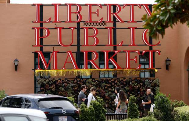 People walk through Liberty Station on March 31, 2026, in San Diego. (K.C. Alfred / The San Diego Union-Tribune)