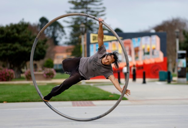 Sam Tribble practices on a Cyr wheel in Liberty Station on March 31, 2026, in San Diego. (K.C. Alfred / The San Diego Union-Tribune)