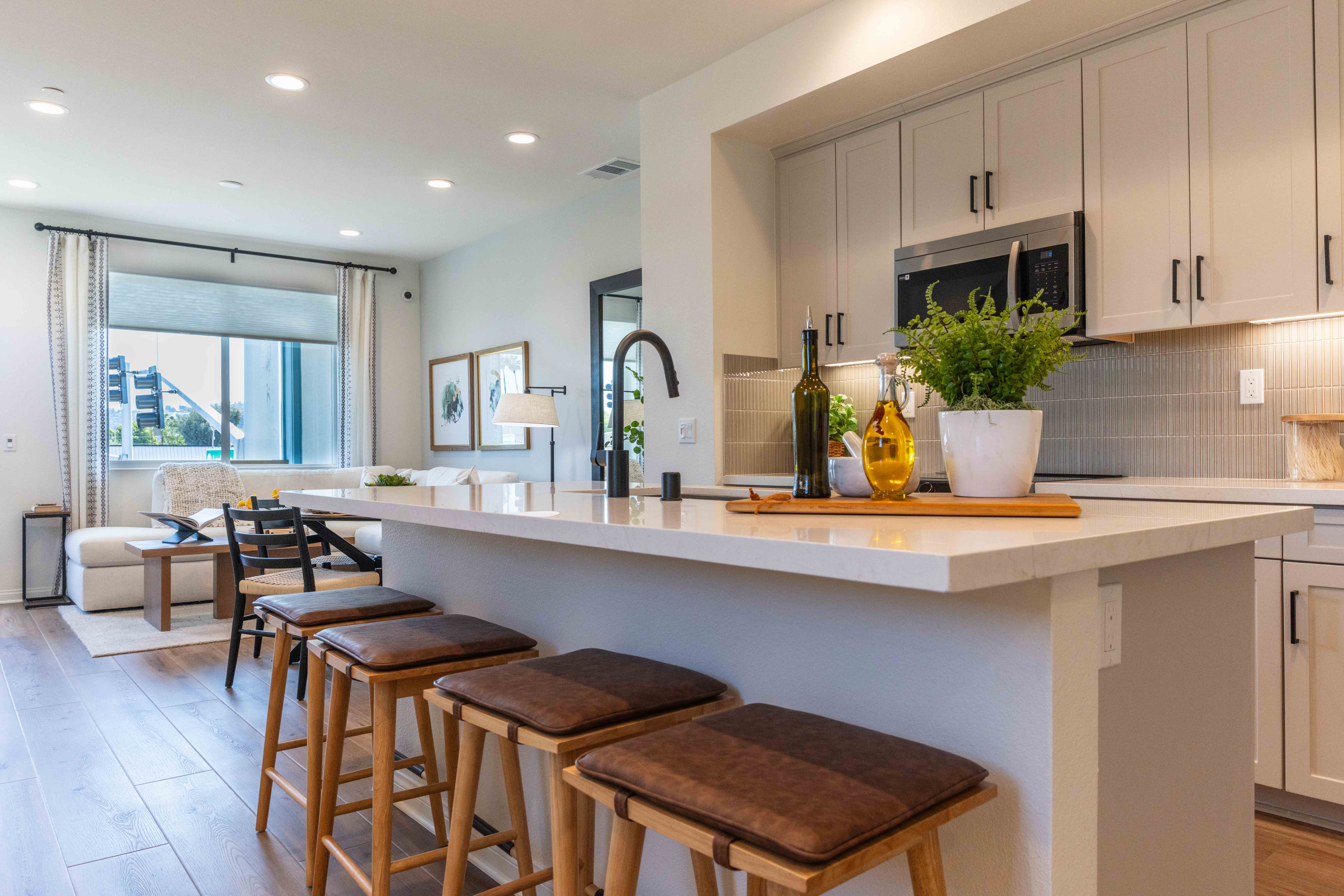 The kitchen and living area of a new home in...