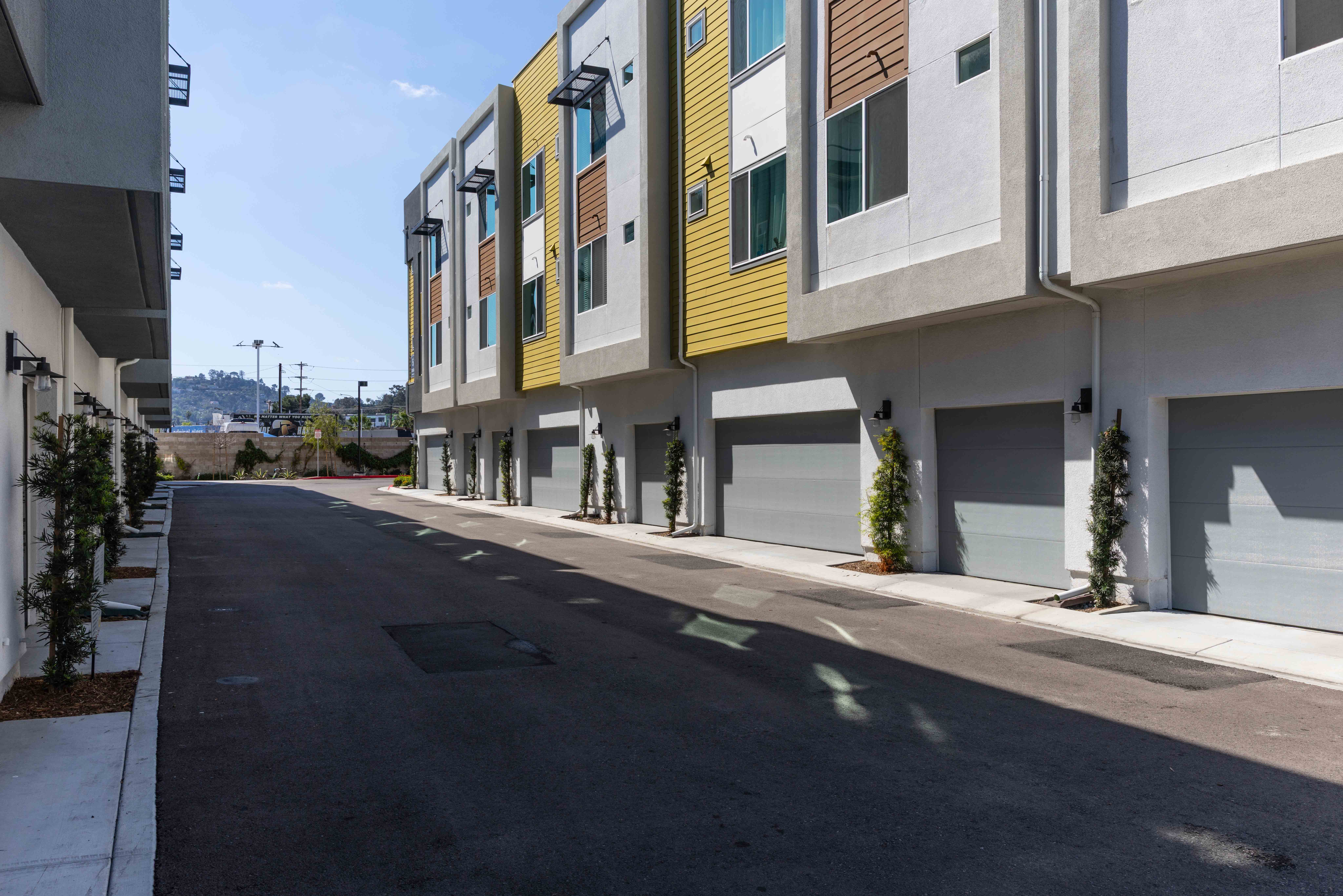 Each townhome at the Gateway development in El Cajon has...