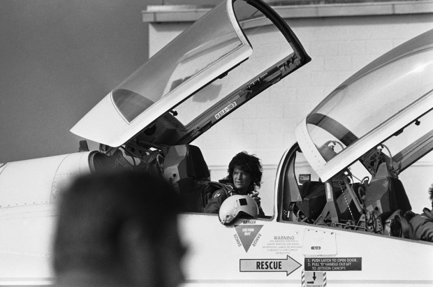 Astronaut Sally Ride sits in her jet at Kennedy Space Center on Wednesday, June 16, 1983 in Florida, just after she and four other crew members arrived to prepare for a scheduled on Saturday launch of the space shuttle Challenger. Mr. Ride is the first American female to travel into space. (AP Photo)