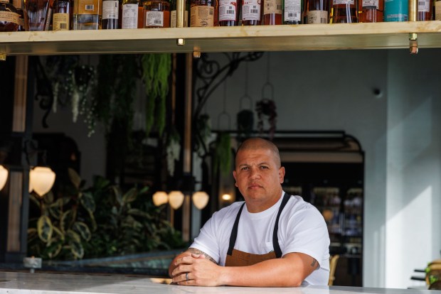 Chef and owner Brad Wise at the street-side bar counter of À L'ouest in North Park on Tuesday, Feb. 10, 2026 in San Diego. (Kristian Carreon / The San Diego Union-Tribune)