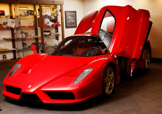 A 2003 Ferrari Enzo owned by Bill Ceno is displayed at his home on April 8, 2026 in Rancho Santa Fe, CA.(K.C. Alfred / The San Diego Union-Tribune)