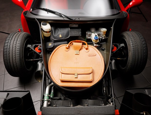 Custom luggage is shown in the front of a 1990 Ferrari F40 owned by Bill Ceno at his home on April 8, 2026 in Rancho Santa Fe, CA.(K.C. Alfred / The San Diego Union-Tribune)