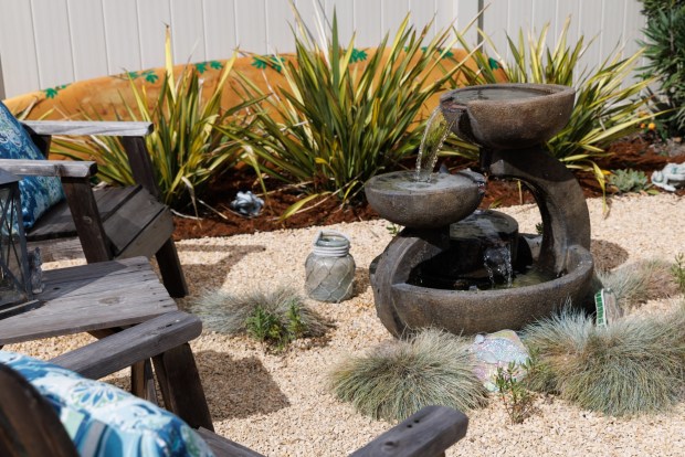 A fountain is a key feature in the seating area. (Kristian Carreon / The San Diego Union-Tribune)