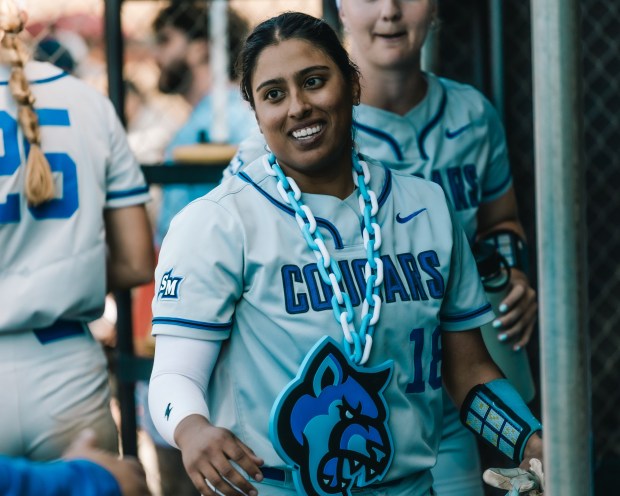 Jillian Albayati is all smiles in the Cal State San Marcos dugout. (Cal State San Marcos athletics)