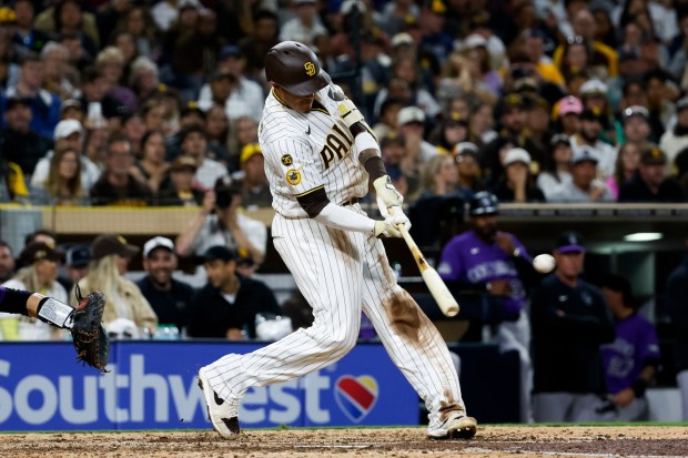 Manny Machado of the San Diego Padres singles against the San Diego Padres during the eighth inning against the Colorado Rockies at Petco Park on Thursday, April 9, 2026 in San Diego, California. (Meg McLaughlin / The San Diego Union-Tribune)